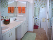 Master Bath With Walk-In Shower And Double Walk-In Closets